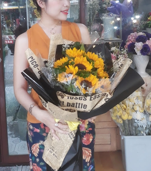 Bó hoa hướng dương bạn đẹp tỏa sáng đầy ý nghĩa thích hợp tặng sinh nhật bạn, tặng mẹ tại shop Hoa Tươi Phố Thành Rạch Giá Kiên Giang.